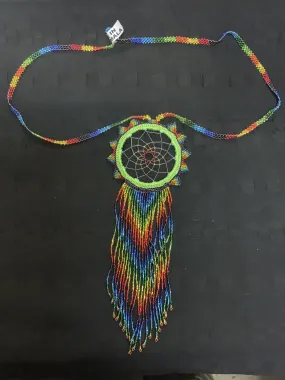 Guatemalan handcrafted beaded dream catcher necklace. 28” neck, 10 inch pendant drop.